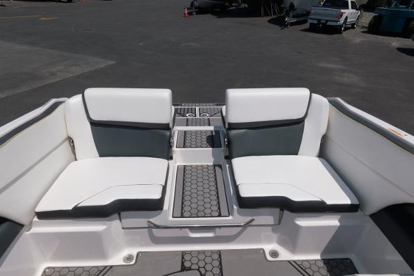 Slide: The Image of 2017 Scarab 255 HO Impulse boat interior with white and gray seating. - 4