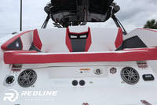 Slide: The Image of 2024 Scarab 285 ID boat rear seating and audio system. - 18