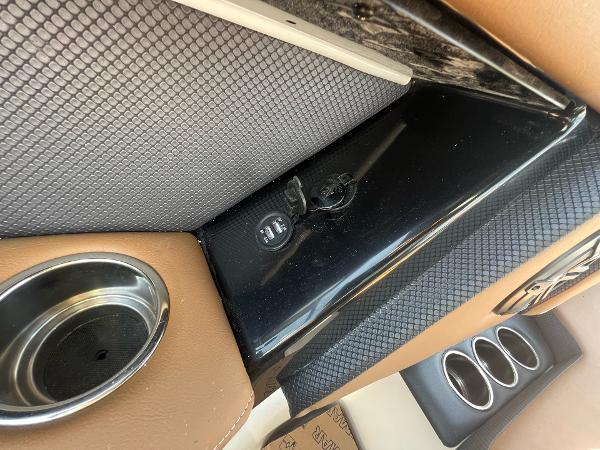 Slide: The Image of 2024 Scarab 285 ID interior detail with cup holders and USB ports. - 29