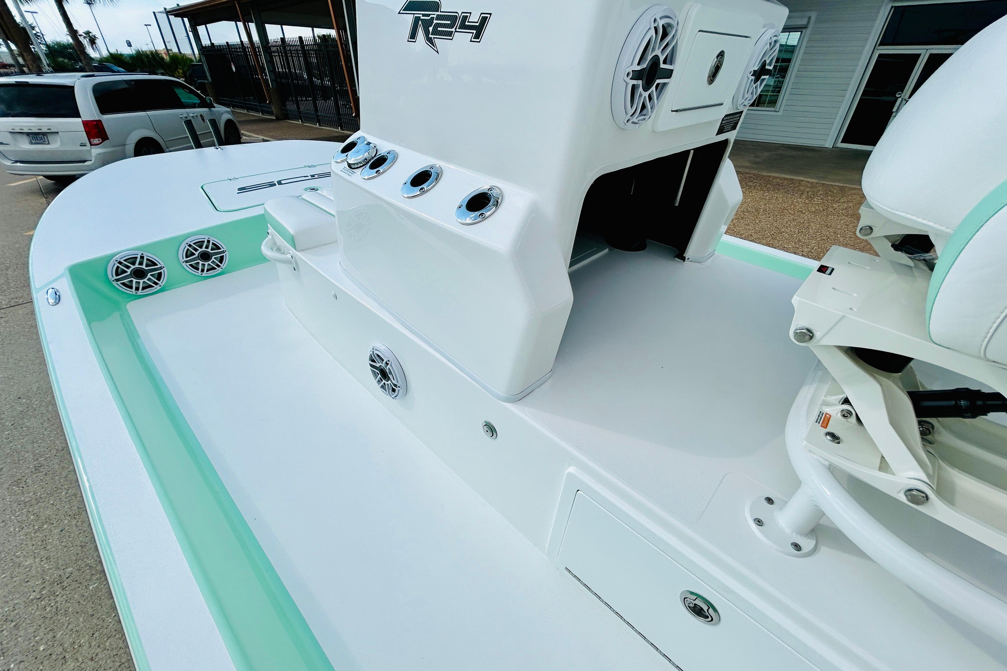Slide: The Image of 2026 SCB R24 boat deck with speakers and seating, showcasing modern design. - 12