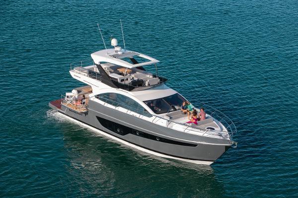 Slide: The Image of 2024 Schaefer 600 yacht cruising on open water. - 0
