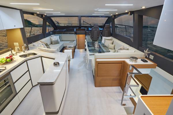 Slide: The Image of Luxurious interior of 2024 Schaefer 600 yacht with modern kitchen and seating area. - 13