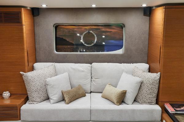Slide: The Image of Luxurious interior of 2024 Schaefer 600 yacht with plush sofa and decorative pillows. - 25