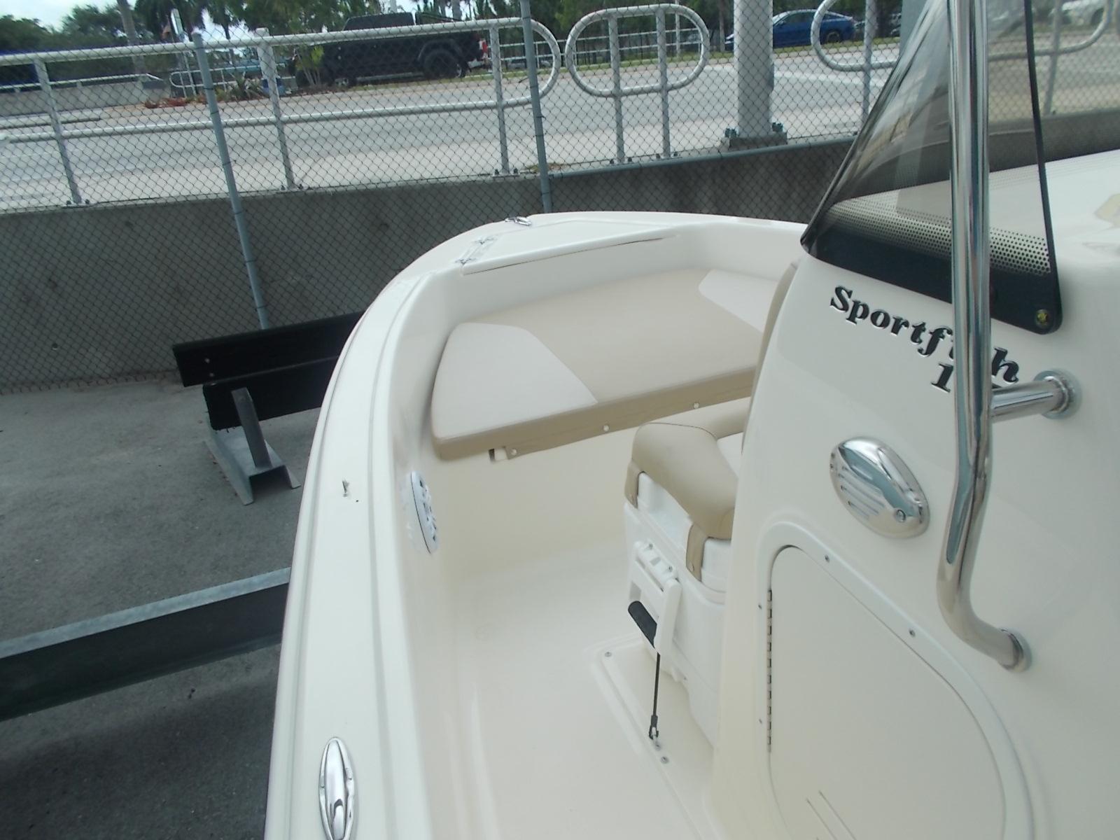 Slide: The Image of 2025 Scout 175 Sportfish boat interior with seating and console. - 7