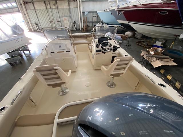 Slide: The Image of 2024 Scout 195 Sport Dorado boat interior in a showroom. - 7