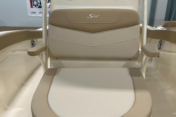 Slide: The Image of 2024 Scout 215 XSF boat seat with beige and white upholstery. - 10