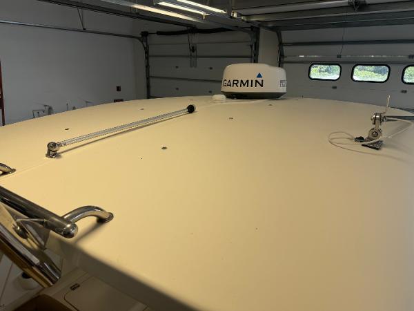 Slide: The Image of 2014 Scout 275 Dorado boat with Garmin radar in garage. - 51