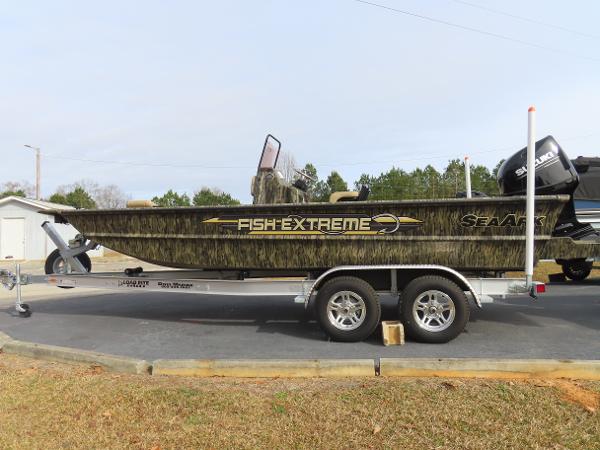 Slide: The Image of 2025 SeaArk 2072 FXT Fish Extreme boat on a trailer. - 19