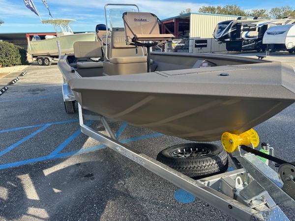 Slide: The Image of 2024 SeaArk 2072 VFX Elite CC boat on trailer in outdoor lot. - 8