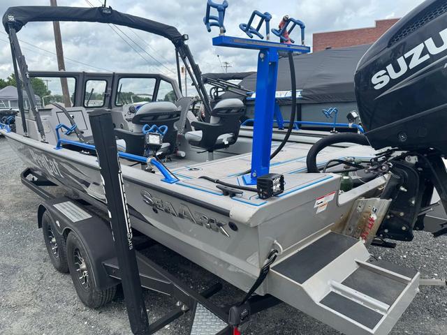 Slide: The Image of 2023 SeaArk Pro Cat 240 boat with Suzuki engine, equipped for fishing. - 12