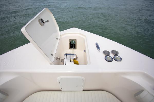 Slide: The Image of 2023 Sea Born LX26 boat anchor storage compartment. - 23