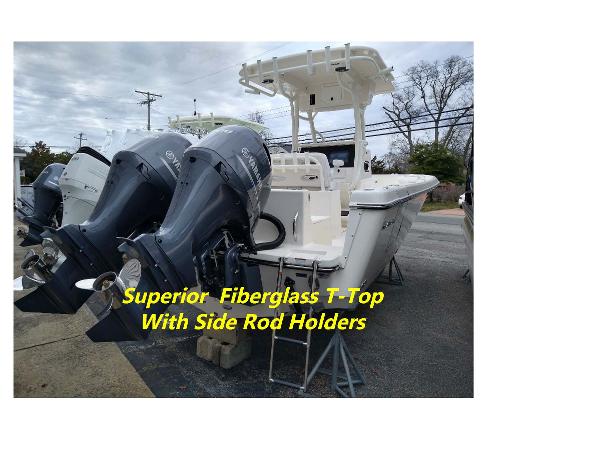 Slide: The Image of 2023 Sea Born LX26 boat with dual engines and fiberglass T-top. - 4