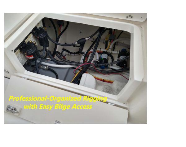 Slide: The Image of 2023 Sea Born LX26 boat with professional-organized rigging and easy bilge access. - 5
