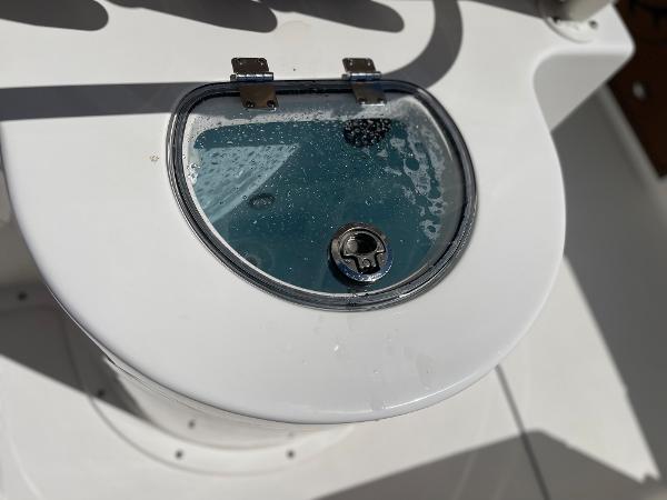 Slide: The Image of 2024 Sea Born LX 26 livewell with water and bubbles. - 14