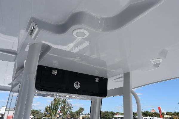Slide: The Image of 2025 Sea Cat 26 Hybrid Catamaran interior ceiling with storage compartment. - 11