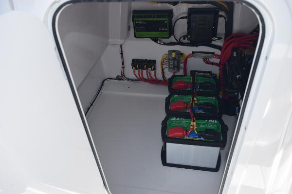 Slide: The Image of Battery compartment of 2025 Sea Cat 26 Hybrid Catamaran with electrical components. - 13