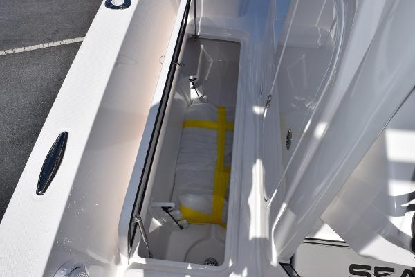 Slide: The Image of 2025 Sea Cat 26 Hybrid Catamaran storage compartment with yellow straps. - 14