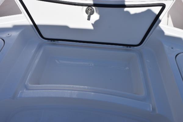 Slide: The Image of Storage compartment of 2025 Sea Cat 26 Hybrid Catamaran, open with visible latch. - 18