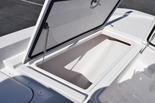 Slide: The Image of Open storage compartment on 2025 Sea Cat 26 Hybrid Catamaran deck. - 19