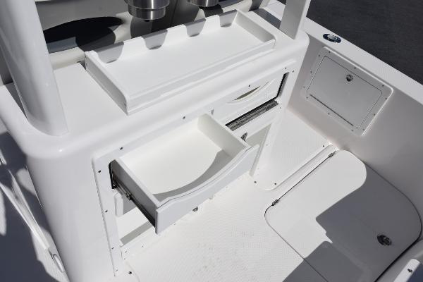 Slide: The Image of 2025 Sea Cat 26 Hybrid Catamaran interior with open storage drawer. - 27