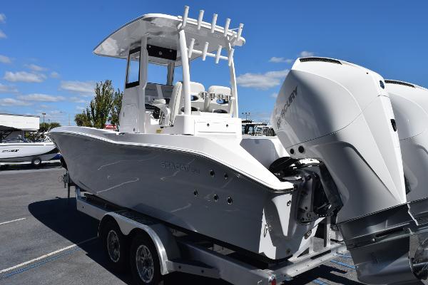 Slide: The Image of 2025 Sea Cat 26 Hybrid Catamaran on trailer, featuring dual outboard engines. - 4