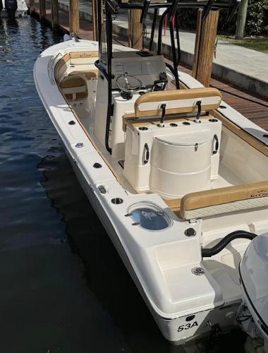 Slide: The Image of 2024 Sea Chaser 24 HFC boat docked, featuring spacious deck and modern amenities. - 1