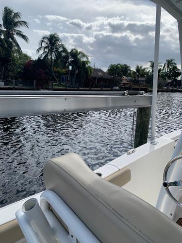 Slide: The Image of 2017 Sea Fox 226 Commander boat on a calm waterway with palm trees. - 11