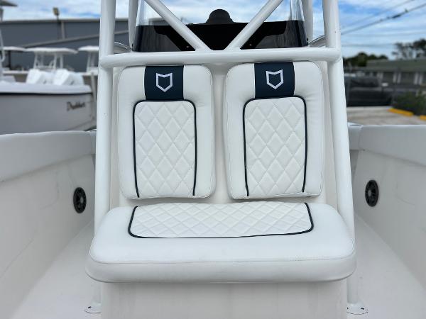 Slide: The Image of 2024 Sea Fox 228 Commander boat with white cushioned seating. - 17