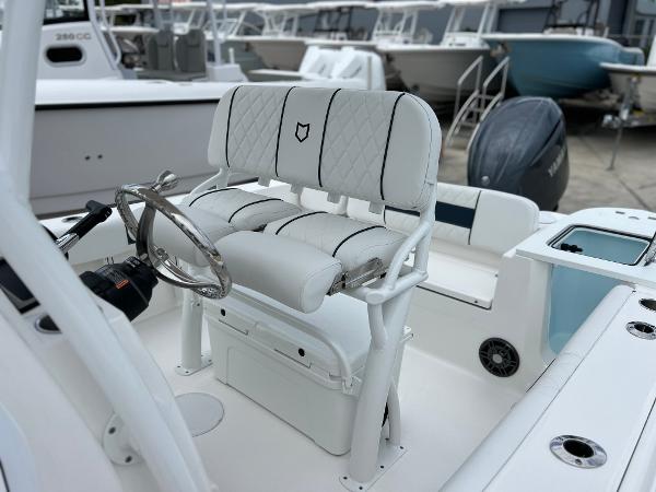 Slide: The Image of 2024 Sea Fox 228 Commander boat interior with helm and seating. - 30