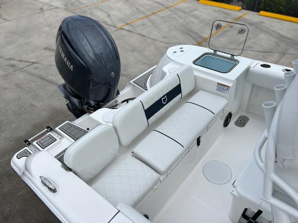 Slide: The Image of 2024 Sea Fox 228 Commander boat with Yamaha engine, white seating, and modern amenities. - 31