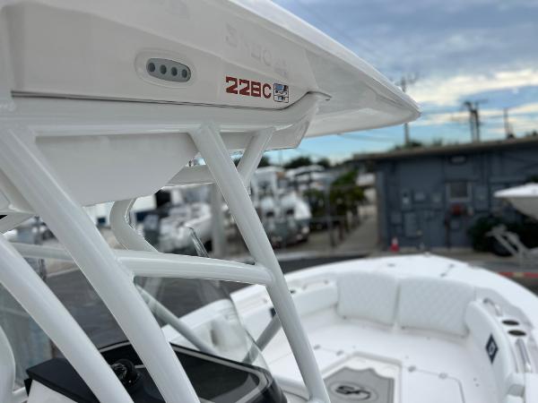 Slide: The Image of 2024 Sea Fox 228 Commander boat, close-up of the helm and seating area. - 42