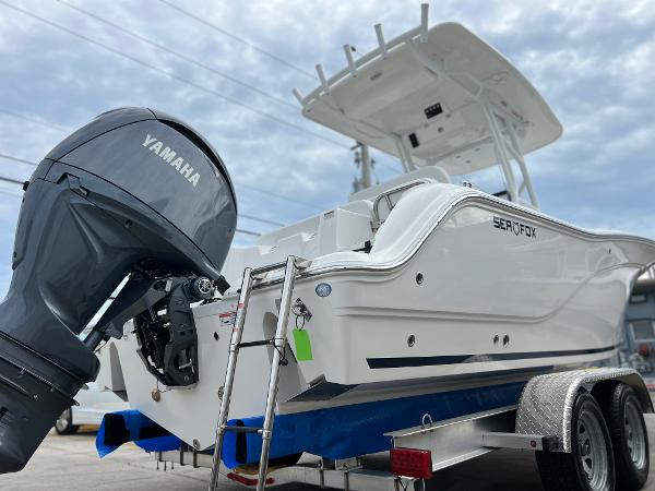 Slide: The Image of 2024 Sea Fox 228 Commander boat with Yamaha outboard motor on trailer. - 45