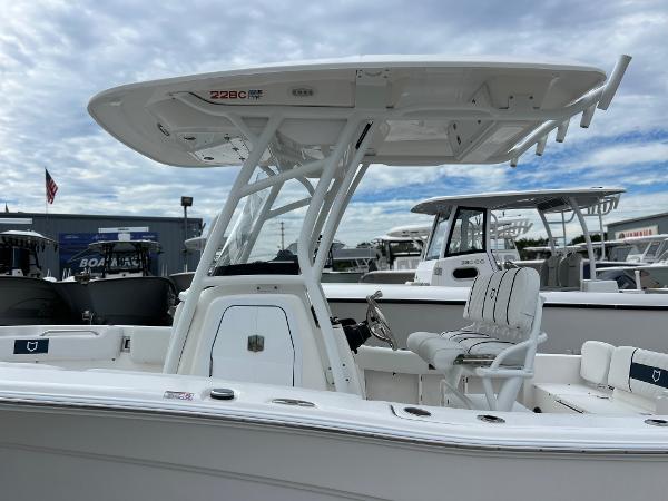 Slide: The Image of 2024 Sea Fox 228 Commander center console boat with T-top and seating. - 47