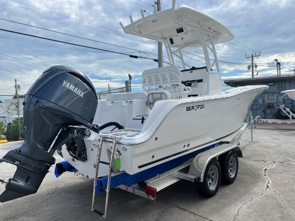 Slide: The Image of 2024 Sea Fox 228 Commander boat with Yamaha outboard motor on trailer. - 7