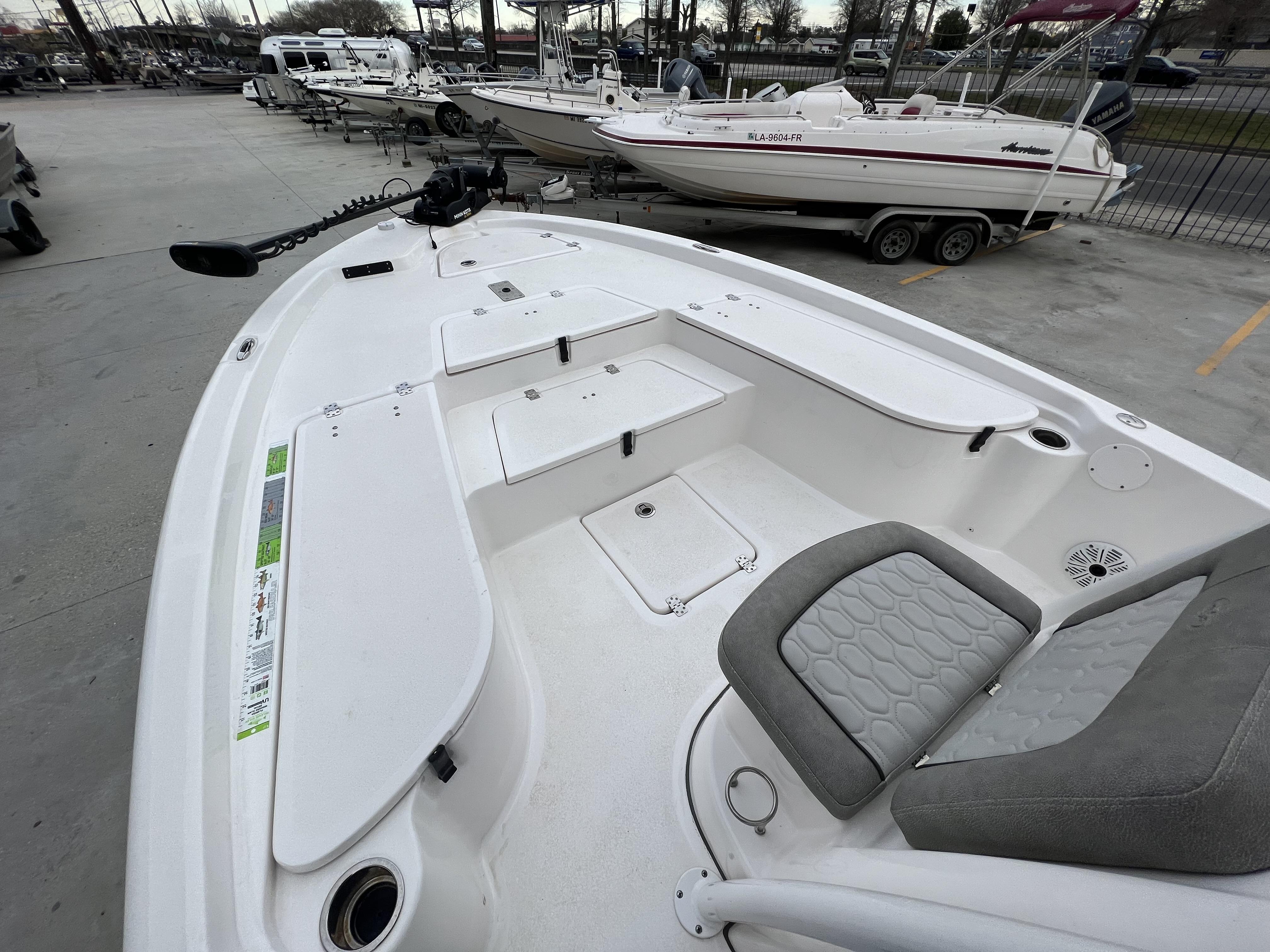 Slide: The Image of 2020 Sea Fox 240 Viper boat interior with seating and storage compartments. - 3