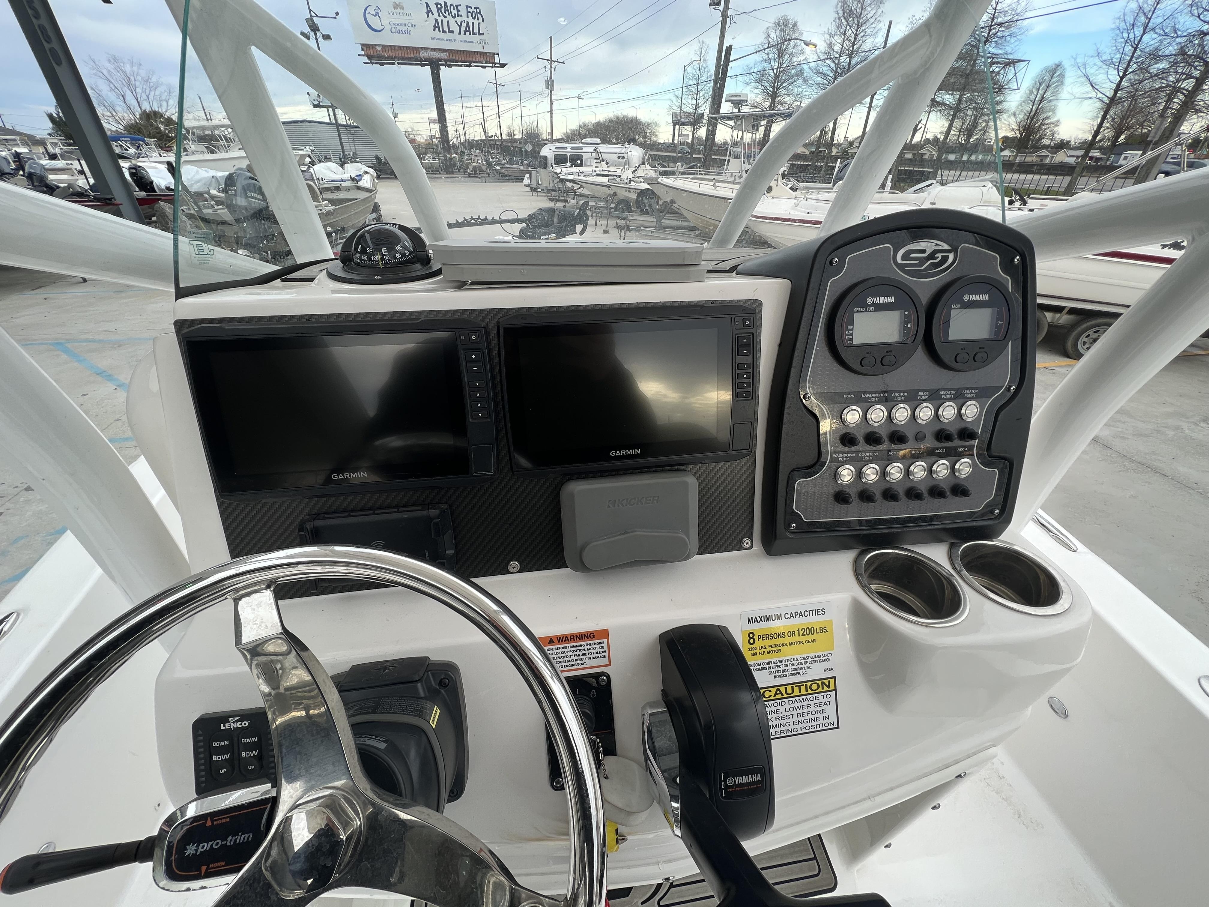 Slide: The Image of 2020 Sea Fox 240 Viper boat dashboard with Garmin displays and Yamaha controls. - 4