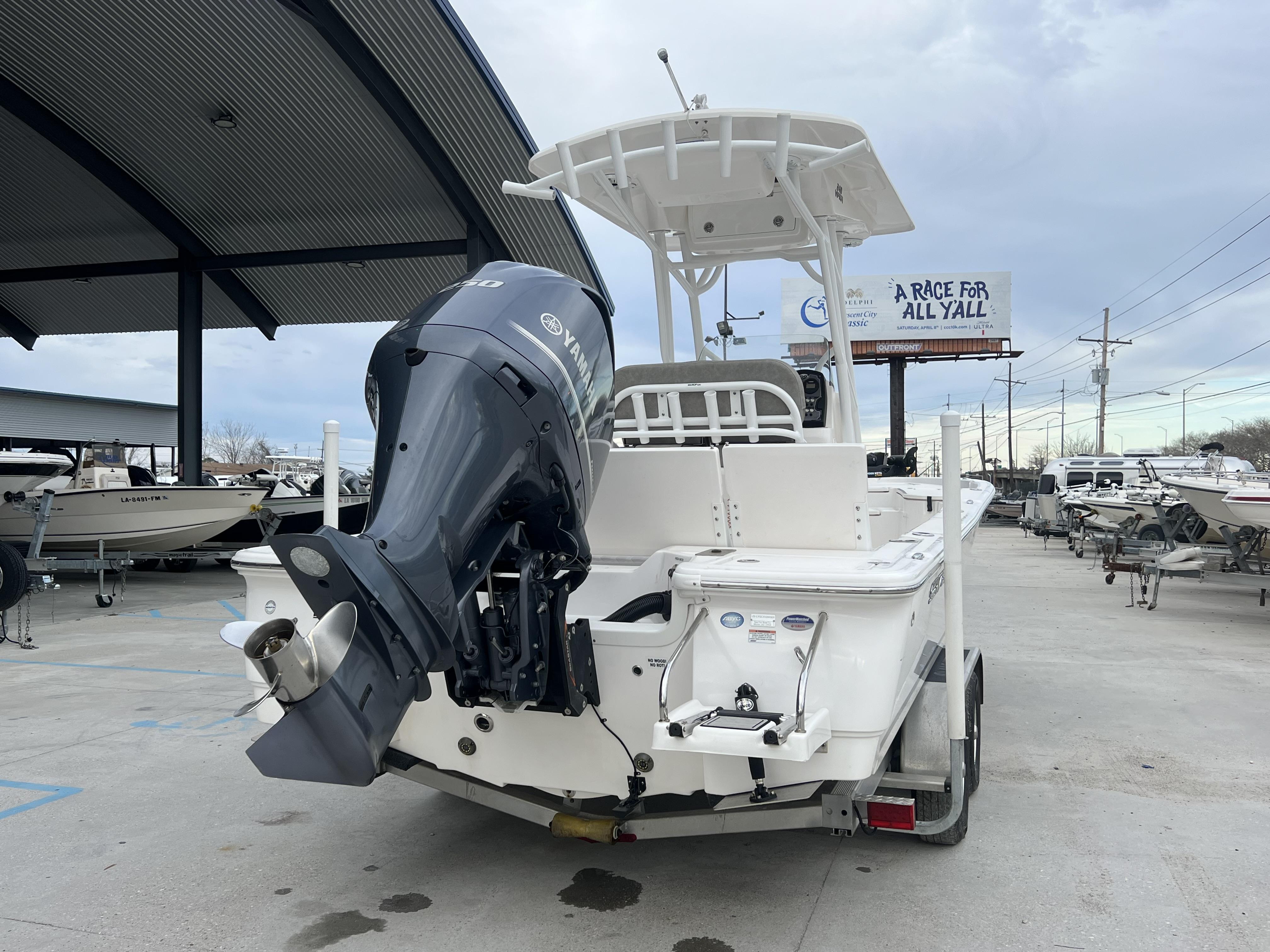 Slide: The Image of 2020 Sea Fox 240 Viper boat with Yamaha outboard motor in a marina. - 6