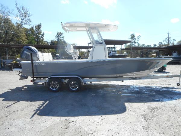 Slide: The Image of 2024 Sea Fox 251 BAYFOX boat on a trailer, side view. - 0