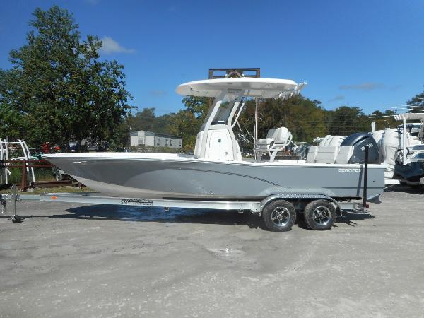 Slide: The Image of 2024 Sea Fox 251 BAYFOX boat on a trailer, side view. - 1