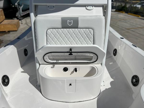 Slide: The Image of 2024 Sea Fox 251 Bay Fox boat interior with storage compartment. - 10