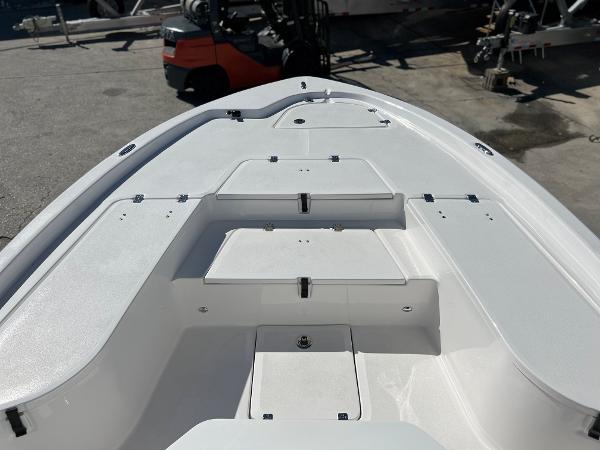 Slide: The Image of 2024 Sea Fox 251 Bay Fox boat deck with storage compartments. - 13