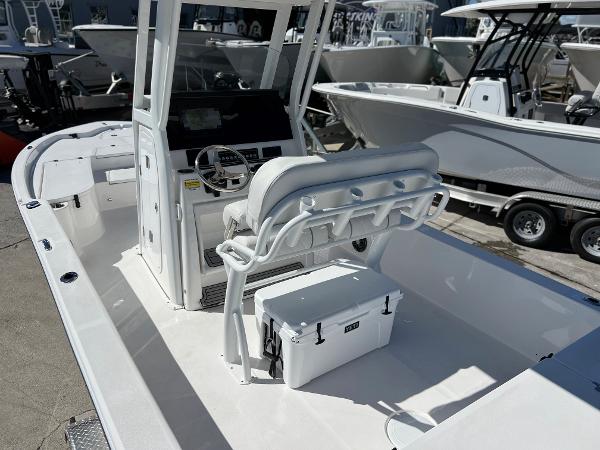 Slide: The Image of 2024 Sea Fox 251 Bay Fox boat interior with console and seating. - 29