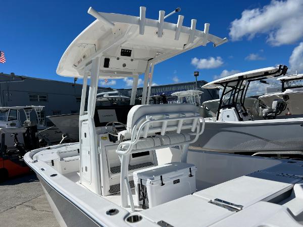 Slide: The Image of 2024 Sea Fox 251 Bay Fox boat with T-top and fishing rod holders. - 30
