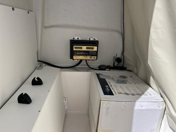 Slide: The Image of 2024 Sea Fox 251 Bay Fox interior with equipment and storage. - 33