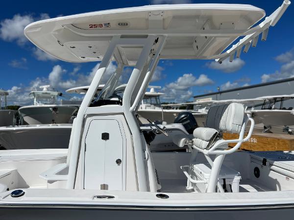Slide: The Image of 2024 Sea Fox 251 Bay Fox boat with T-top and center console. - 35
