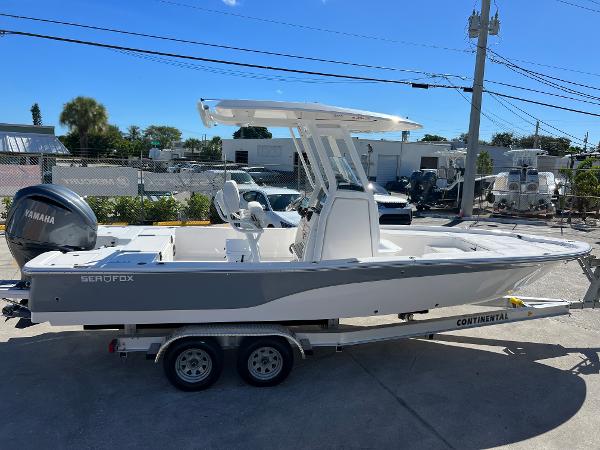 Slide: The Image of 2024 Sea Fox 251 Bay Fox boat on a trailer with Yamaha outboard motor. - 5