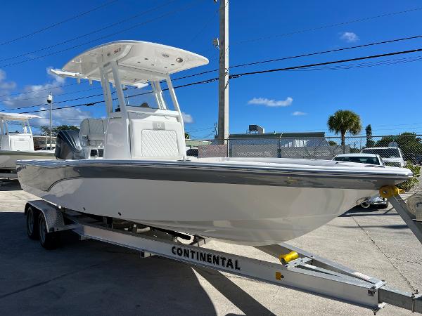 Slide: The Image of 2024 Sea Fox 251 Bay Fox boat on Continental trailer, side view. - 6