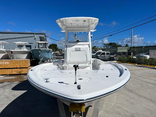 Slide: The Image of 2024 Sea Fox 251 Bay Fox boat in a marina, front view. - 7