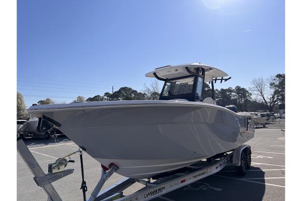 Slide: The Image of 2024 Sea Fox 288 Commander boat on a trailer in a parking lot. - 3