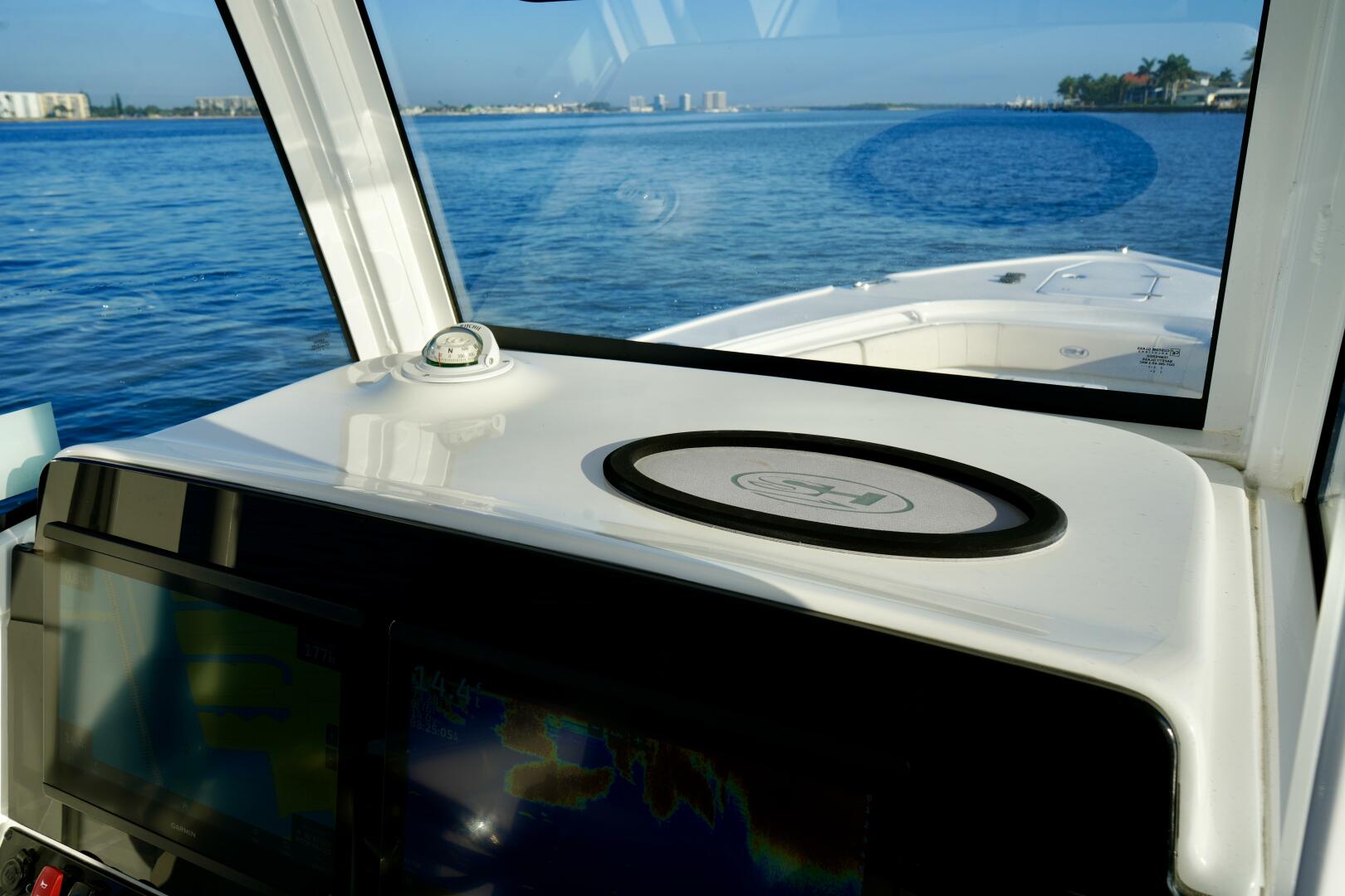 Slide: The Image of Electronics 2024 Sea Hunt 30 305 Ultra Center Console - 5124801